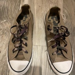 Converse low top- green and camo with camo laces.youth size 3 but is women’s 5.5